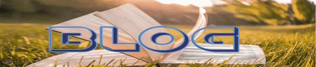Imagen de un libro sobre un campo abierto por el viento con la palabra blog sobrevolando la imagen