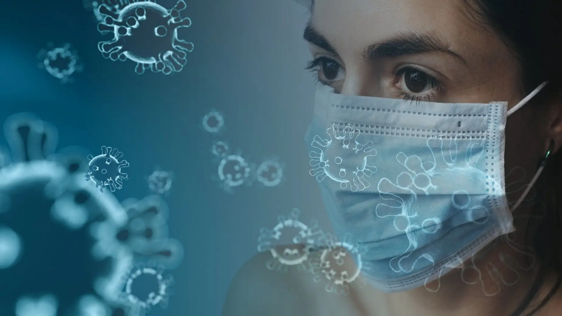 imagen de una mujer con mascarilla y virus flotando a su alrededor